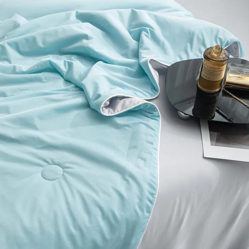 https://cdn.shopify.com/s/files/1/0723/5190/8097/files/cooling-blankets-smooth-air-condition-comforter-761330.jpg?v=1729458195