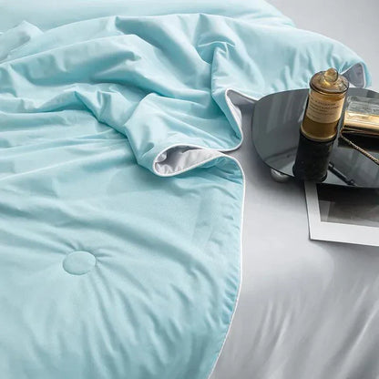 https://cdn.shopify.com/s/files/1/0723/5190/8097/files/cooling-blankets-smooth-air-condition-comforter-818126.webp?v=1729458195